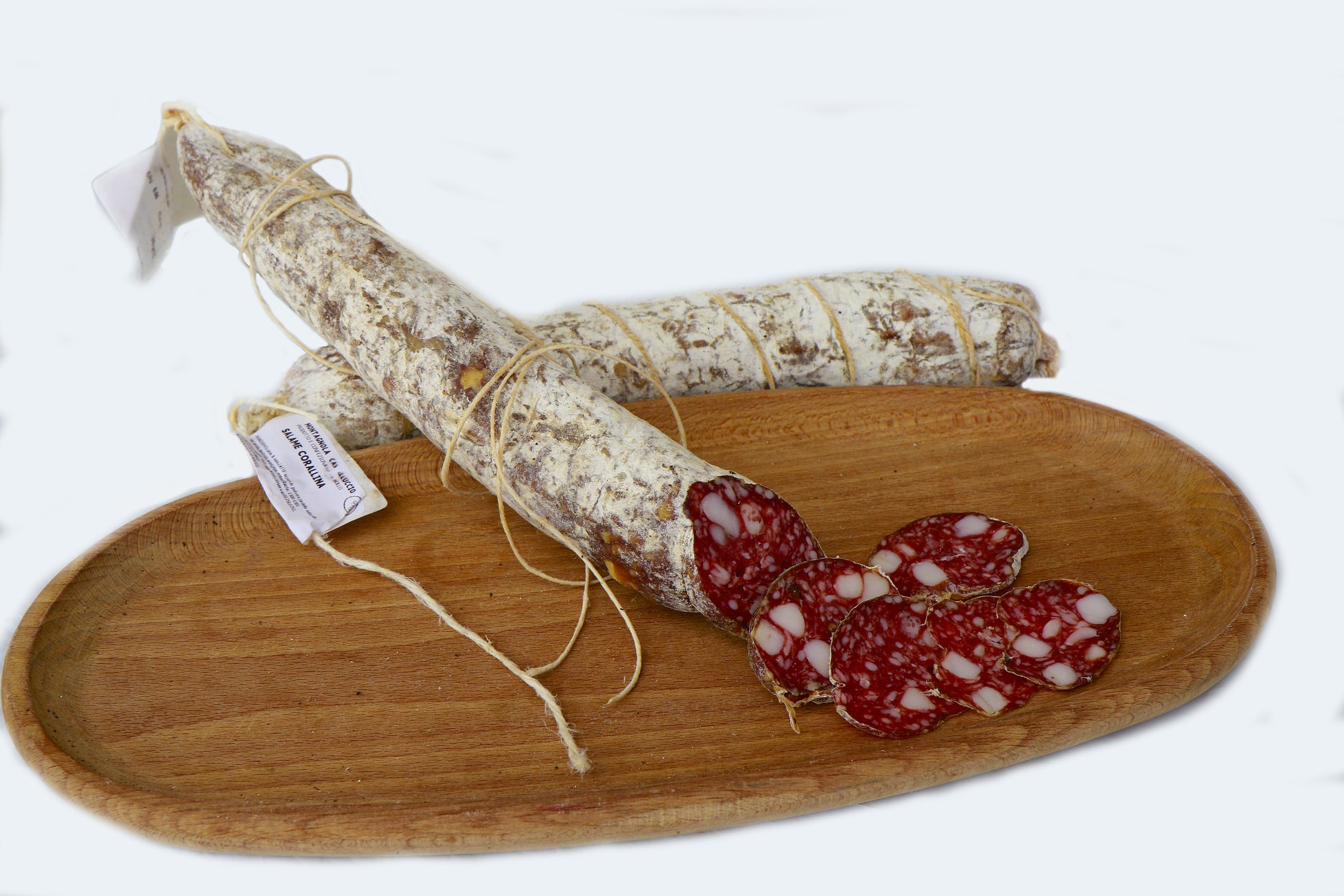 Salame Corallina affettato su tagliere, un classico della tradizione di Norcia